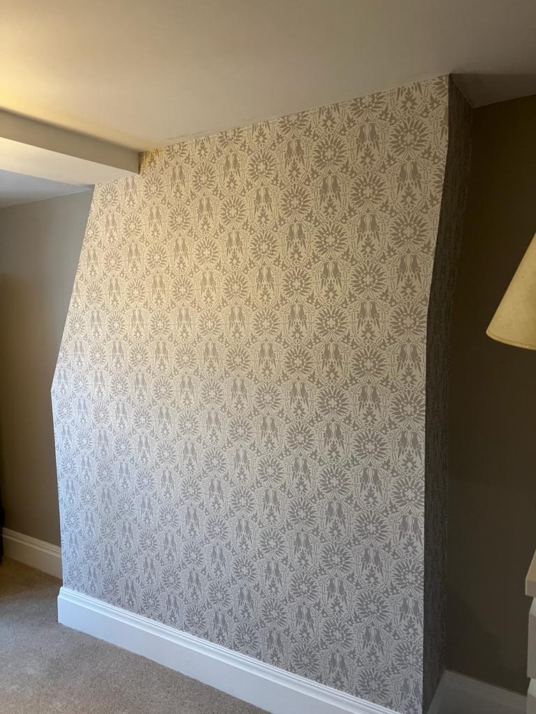 Beautiful home decorated with wallpaper and painted wood paneling by decorator in Huddersfield at Ward Decorating Contractors2